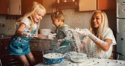 Children cooking with her mum in the kitchen..jpg