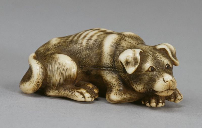 Izumiya_Tomotada_-_Netsuke_in_the_Form_of_a_Dog_-_Walters_711020_-_Three_Quarter.jpg