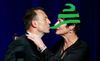l_abott_wife_defends lizard kiss.jpg